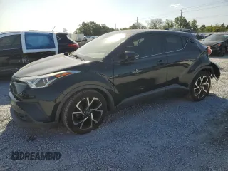 2019 Toyota C-HR XLE z VIN JTNKHMBX9K1016158, wystawiony jako Copart lot #54121995 z przebiegiem 119 716 mil mil oraz Szkoda całkowita • Salvage title. Historia ofert i sprzedaży dostępna na DreamBid. Obrazek 1.