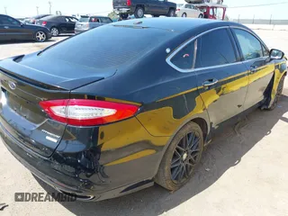 2016 Ford Fusion Titanium with VIN 3FA6P0K9XGR390364, listed as a IAAI auction lot 42165029 with 188,693 mi miles and . Bid and sale history available at DreamBid. Image 4.