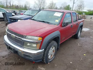 2005 Chevrolet Colorado 1SF LS Z71 with VIN 1GCDT136858133709, listed as a IAAI auction lot 42083101 with 209,919 mi miles. Bid and sale history available at carsss.com. Image 2.