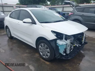 2023 Kia Rio S z VIN 3KPA24AD5PE588003, wystawiony jako IAAI lot #42019392 z przebiegiem 26 756 mil mil oraz . Historia ofert i sprzedaży dostępna na DreamBid. Obrazek 1.