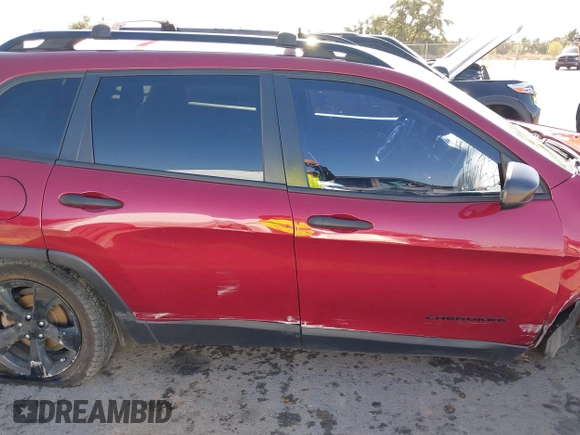 2017 Jeep Cherokee Altitude with VIN 1C4PJLABXHW661153, listed as a IAAI auction lot 41058821 with 167,418 mi miles and . Bid and sale history available at DreamBid. Image 14.