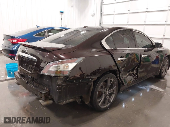 2014 Nissan Maxima SV z VIN 1N4AA5AP5EC910605, wystawiony jako IAAI lot #42082685 z przebiegiem 83 628 mil mil oraz . Historia ofert i sprzedaży dostępna na DreamBid. Obrazek 6.