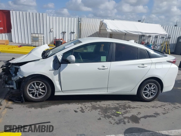2016 Toyota Prius Four with VIN JTDKARFU7G3013485, listed as a IAAI auction lot 41954277 with 130,336 mi miles. Bid and sale history available at carsss.com. Image 14.