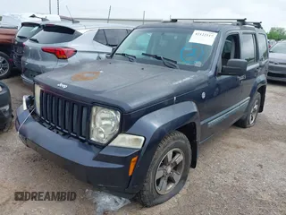 2008 Jeep Liberty Sport with VIN 1J8GN28K28W261858, listed as a IAAI auction lot 42122117 with 97,865 mi miles. Bid and sale history available at carsss.com. Image 2.