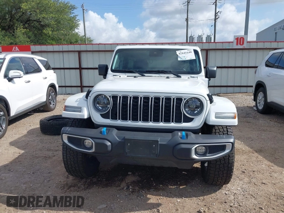 2024 Jeep Wrangler Sahara z VIN 1C4RJXP6XRW249035, wystawiony jako IAAI lot #42441640 z przebiegiem 34 128 mil mil oraz . Historia ofert i sprzedaży dostępna na DreamBid. Obrazek 13.
