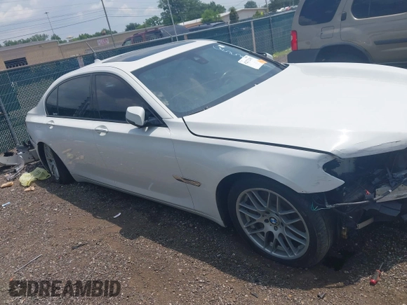 2015 BMW 7 Series 750Li xDrive with VIN WBAYF8C57FD655004, listed as a IAAI auction lot 42272205 with 77,677 mi miles and . Bid and sale history available at DreamBid. Image 14.