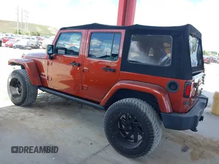2014 Jeep Wrangler Unlimited Sahara z VIN 1C4BJWEG1EL209431, wystawiony jako IAAI lot #42325022 z przebiegiem 64 529 mil mil oraz . Historia ofert i sprzedaży dostępna na DreamBid. Obrazek 14.