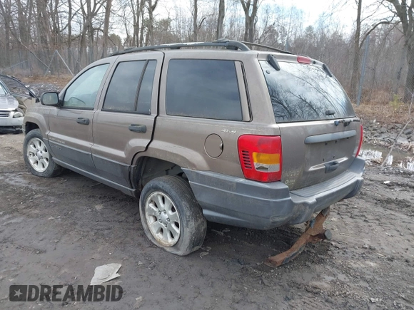2001 Jeep Grand Cherokee Laredo with VIN 1J4GW48SX1C658610, listed as a IAAI auction lot 41831013 with 200,142 mi miles and . Bid and sale history available at DreamBid. Image 3.