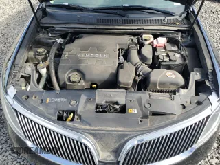 2014 Lincoln MKS with VIN 1LNHL9EK7EG606902, listed as a Copart auction lot 41837775 with 138,764 mi miles and Salvage Title. Bid and sale history available at DreamBid. Image 11.