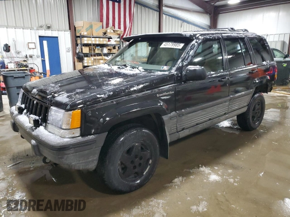 1995 Jeep Grand Cherokee Laredo with VIN 1J4GZ58Y5SC565187, listed as a Copart auction lot 45179985 with 122,863 mi miles and Salvage title. Bid and sale history available at DreamBid. Image 1.