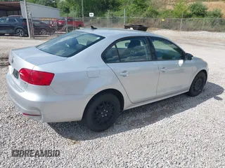 2014 Volkswagen Jetta SE z VIN 3VWD17AJ3EM246296, wystawiony jako IAAI lot #42163106 z przebiegiem 157 853 mil mil oraz . Historia ofert i sprzedaży dostępna na DreamBid. Obrazek 4.