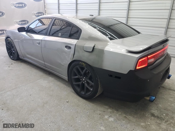 2011 Dodge Charger RT Max with VIN 2B3CM5CT1BH551543, listed as a Copart auction lot 56913624 with 104,221 mi miles and Clean Title. Bid and sale history available at carsss.com. Image 2.
