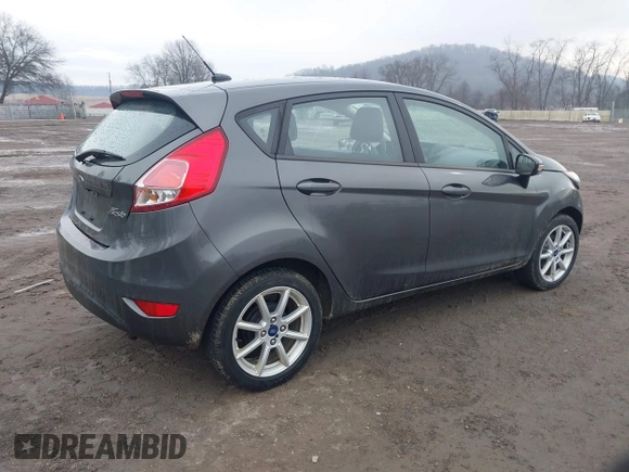 2018 Ford Fiesta SE with VIN 3FADP4EJ9JM126299, listed as a IAAI auction lot 41660973 with 74,730 mi miles. Bid and sale history available at carsss.com. Image 4.