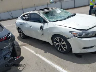 2016 Nissan Maxima SV z VIN 1N4AA6AP2GC437206, wystawiony jako IAAI lot #42082780 z przebiegiem Nie podano mil oraz . Historia ofert i sprzedaży dostępna na DreamBid. Obrazek 14.