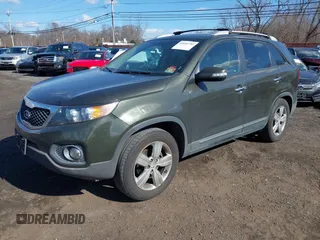 2012 Kia Sorento EX with VIN 5XYKU3A61CG269558, listed as a IAAI auction lot 41651792 with 171,754 mi miles. Bid and sale history available at carsss.com. Image 2.