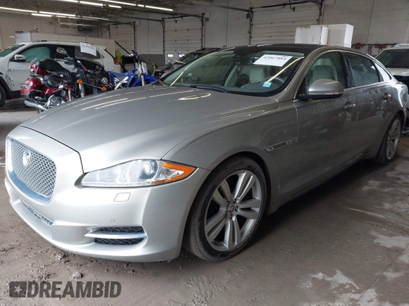 2013 Jaguar XJ Portfolio with VIN SAJWJ2GD0D8V50948, listed as a IAAI auction lot 42067884 with 110,053 mi miles and . Bid and sale history available at DreamBid. Image 2.