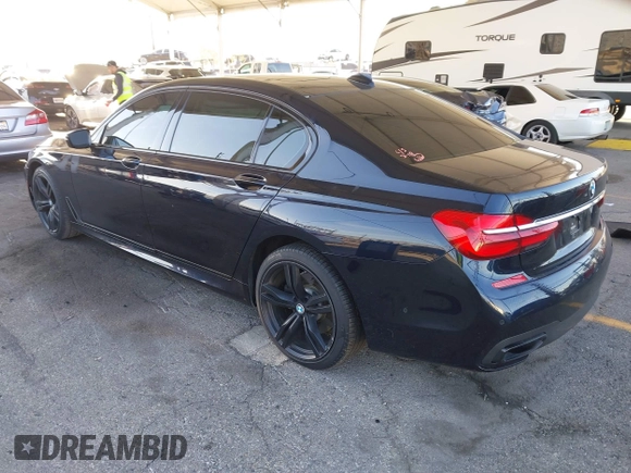 2019 BMW 7 Series 740i with VIN WBA7E2C58KB218419, listed as a IAAI auction lot 41831080 with 97,752 mi miles and . Bid and sale history available at DreamBid. Image 3.