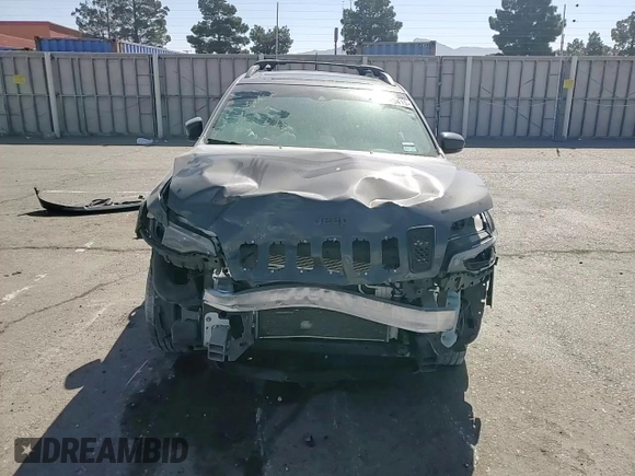 2021 Jeep Cherokee 80th Anniversary with VIN 1C4PJMMX2MD106233, listed as a Copart auction lot 52980415 with 77,979 mi miles and Salvage title. Bid and sale history available at DreamBid. Image 12.