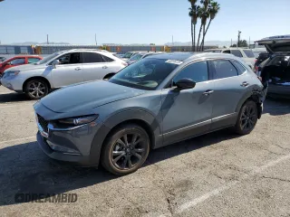 2022 Mazda CX-30 Premium with VIN 3MVDMBDY5NM438081, listed as a Copart auction lot 58010415 with 16,898 mi miles and Salvage title. Bid and sale history available at DreamBid. Image 1.