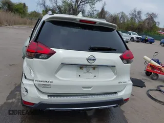 2017 Nissan Rogue S with VIN 5N1AT2MM3HC794051, listed as a IAAI auction lot 42063921 with 129,586 mi miles and . Bid and sale history available at DreamBid. Image 16.