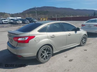 2015 Ford Focus SE with VIN 1FADP3F24FL260387, listed as a IAAI auction lot 41990194 with 80,673 mi miles. Bid and sale history available at carsss.com. Image 4.