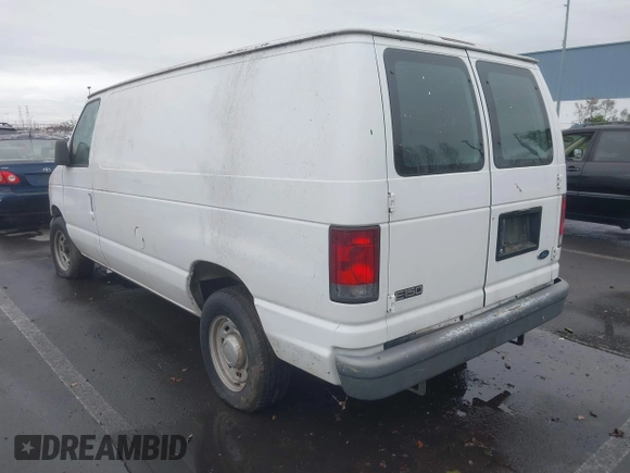 2004 Ford Econoline Cargo with VIN 1FTRE14W44HA43969, listed as a IAAI auction lot 41488289 with 268,097 mi miles. Bid and sale history available at carsss.com. Image 3.