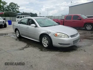 2014 Chevrolet Impala LT with VIN 2G1WB5E33E1165713, listed as a Copart auction lot 60591585 with 203,323 mi miles and Salvage title. Bid and sale history available at DreamBid. Image 14.