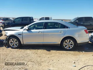 2011 Ford Taurus SEL with VIN 1FAHP2EW5BG133814, listed as a IAAI auction lot 41608224 with 127,075 mi miles. Bid and sale history available at carsss.com. Image 14.