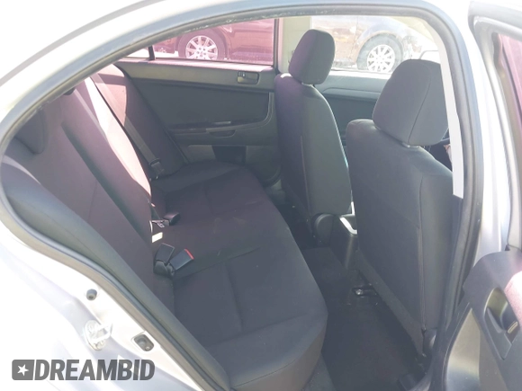 2009 Mitsubishi Lancer DE with VIN JA3AU16UX9U009351, listed as a IAAI auction lot 42139312 with 120,912 mi miles and . Bid and sale history available at DreamBid. Image 8.