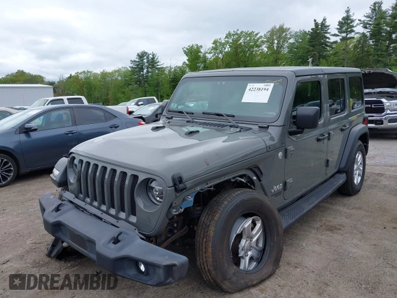 2020 Jeep Wrangler Unlimited Black and Tan with VIN 1C4HJXDG5LW187222, listed as a IAAI auction lot 42238194 with 9,237 mi miles and . Bid and sale history available at DreamBid. Image 2.