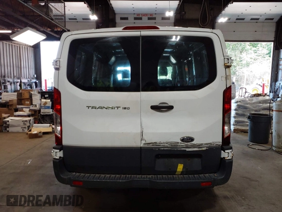 2015 Ford Transit Cargo with VIN 1FTNE1ZM8FKB17731, listed as a IAAI auction lot 42351353 with 74,489 mi miles and . Bid and sale history available at DreamBid. Image 16.