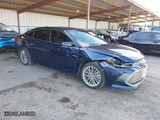 2019 Toyota Avalon Hybrid Limited with VIN 4T1B21FB5KU007633, listed as a IAAI auction lot 41615161 with 132,182 mi miles. Bid and sale history available at carsss.com. Image 1.
