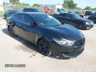 2017 Nissan Maxima Platinum z VIN 1N4AA6APXHC451081, wystawiony jako IAAI lot #42816447 z przebiegiem 94 680 mil mil oraz . Historia ofert i sprzedaży dostępna na DreamBid. Obrazek 1.