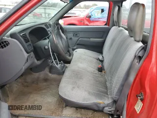 2000 Nissan Frontier XE z VIN 1N6DD21S8YC338304, wystawiony jako Copart lot #83990454 z przebiegiem 184 467 mil mil oraz Szkoda całkowita • Salvage title. Historia ofert i sprzedaży dostępna na DreamBid. Obrazek 7.