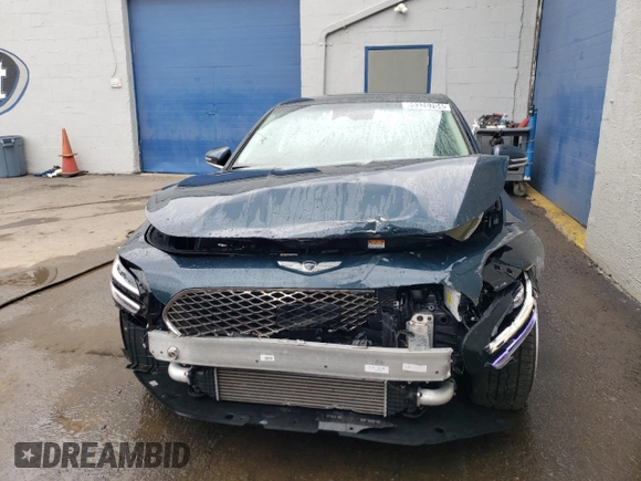 2023 Genesis G70 2.0T with VIN KMTG34TA4PU126996, listed as a Copart auction lot 69326704 with 24,882 mi miles and Non Repairable. Bid and sale history available at DreamBid. Image 5.
