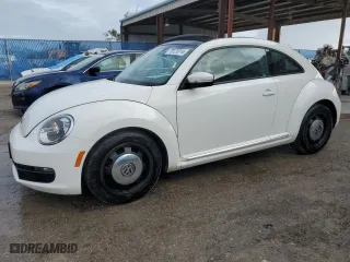 2012 Volkswagen Beetle 2.5L w/Sun/Sound/Nav PZEV with VIN 3VWHP7AT0CM651997, listed as a Copart auction lot 79121014 with 45,560 mi miles and Salvage Title. Bid and sale history available at carsss.com. Image 1.