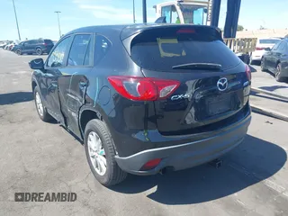 2013 Mazda CX-5 Touring with VIN JM3KE2CEXD0153589, listed as a IAAI auction lot 41855356 with 86,030 mi miles and . Bid and sale history available at DreamBid. Image 3.