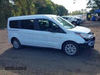 2019 Ford Transit Connect XLT z VIN NM0GE9F27K1405537, wystawiony jako IAAI lot #40491021 z przebiegiem 21 867 mil mil oraz . Historia ofert i sprzedaży dostępna na DreamBid. Obrazek 13.
