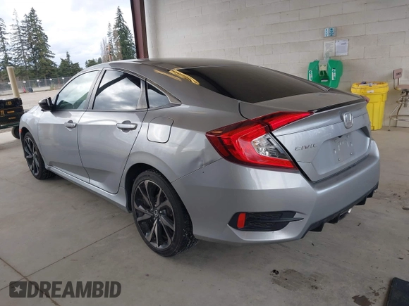 2021 Honda Civic Sport with VIN 2HGFC2F83MH521470, listed as a IAAI auction lot 41828890 with 49,703 mi miles and . Bid and sale history available at DreamBid. Image 3.