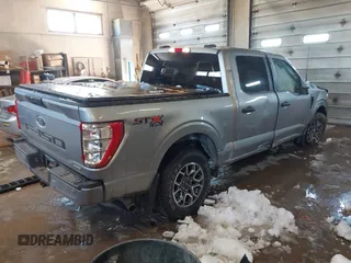2021 Ford F-150 XL with VIN 1FTEW1EP0MKE87078, listed as a IAAI auction lot 41857664 with 43,588 mi miles. Bid and sale history available at carsss.com. Image 4.