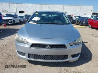 2010 Mitsubishi Lancer DE with VIN JA32U1FU4AU015574, listed as a IAAI auction lot 41770332 with 125,458 mi miles. Bid and sale history available at carsss.com. Image 11.