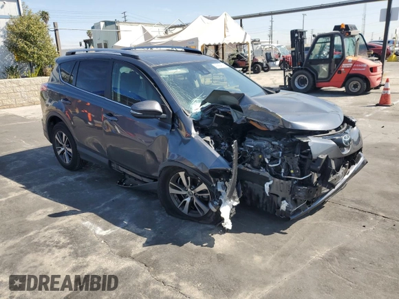 2018 Toyota RAV4 XLE with VIN JTMRFREVXJD251679, listed as a Copart auction lot 49454115 with 48,385 mi miles and Salvage Title. Bid and sale history available at DreamBid. Image 4.