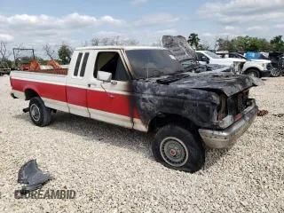 1989 Ford F-250 with VIN 1FTHX26M3KKB47053, listed as a Copart auction lot 52870835 with 0 mi miles and Salvage Title. Bid and sale history available at carsss.com. Image 4.