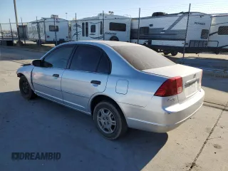 2001 Honda Civic LX with VIN 2HGES16551H562161, listed as a Copart auction lot 71089984 with 0 mi miles and Salvage Title. Bid and sale history available at carsss.com. Image 2.