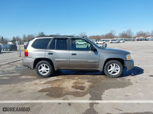 2005 GMC Envoy SLE with VIN 1GKDT13S252331044, listed as a IAAI auction lot 41749219 with NaN miles. Bid and sale history available at carsss.com. Image 14.