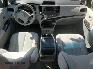 2012 Toyota Sienna LE AAS with VIN 5TDKK3DC7CS195590, listed as a Copart auction lot 57968415 with 201,732 mi miles and Salvage title. Bid and sale history available at DreamBid. Image 8.