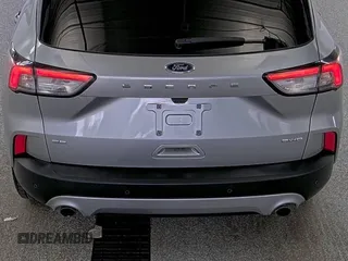 2022 Ford Escape SE z VIN 1FMCU9G66NUB33504, wystawiony jako IAAI lot #42748133 z przebiegiem 74 338 mil mil oraz . Historia ofert i sprzedaży dostępna na DreamBid. Obrazek 24.