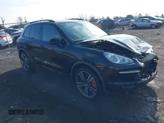 2012 Porsche Cayenne Turbo z VIN WP1AC2A23CLA84310, wystawiony jako IAAI lot #41530314 z przebiegiem 103 859 mil mil oraz . Historia ofert i sprzedaży dostępna na DreamBid. Obrazek 1.