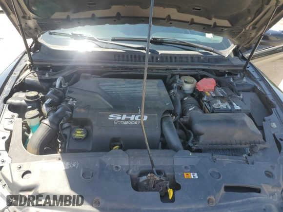 2013 Ford Taurus SHO z VIN 1FAHP2KT7DG133620, wystawiony jako Copart lot #54219005 z przebiegiem Nie podano mil oraz Szkoda całkowita • Salvage title. Historia ofert i sprzedaży dostępna na DreamBid. Obrazek 11.