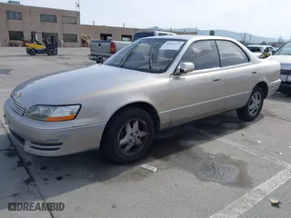 1995 Lexus ES 300 with VIN JT8GK13T0S0100914, listed as a IAAI auction lot 41835394 with 216,277 mi miles. Bid and sale history available at carsss.com. Image 16.
